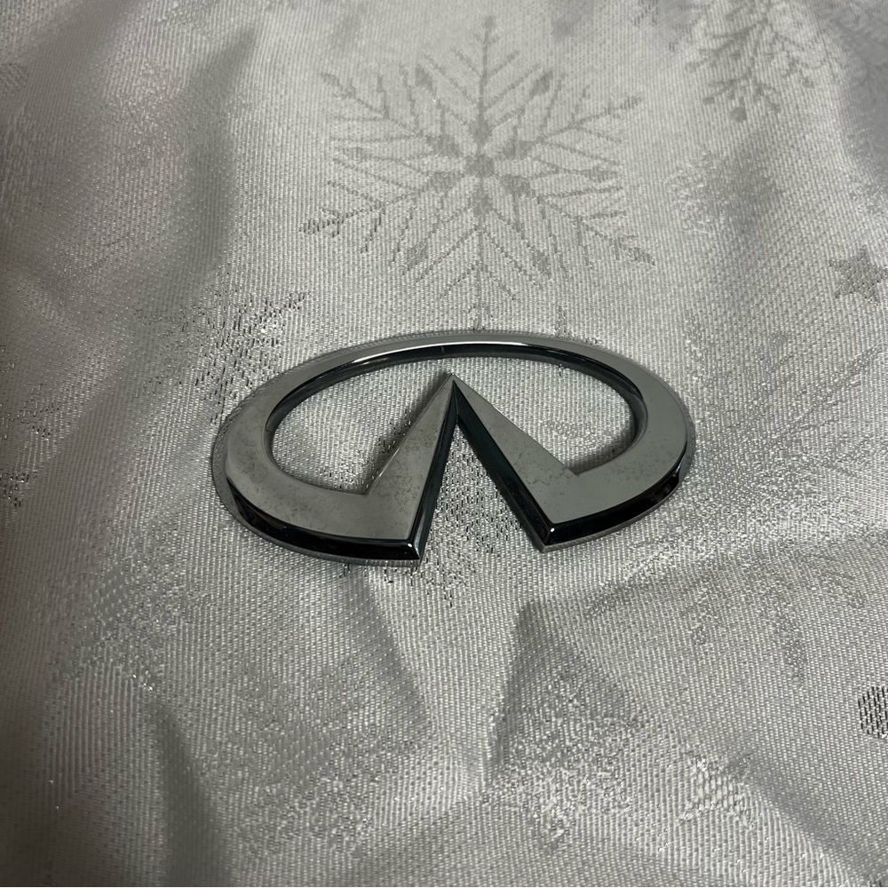 Silver infinity trunk emblem badge OEM